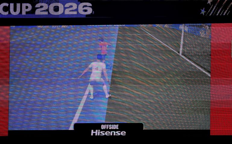 Stadium screen displaying the semi-automated offside graphic for Shoja Khalilzadeh’s disallowed goal against Egypt.